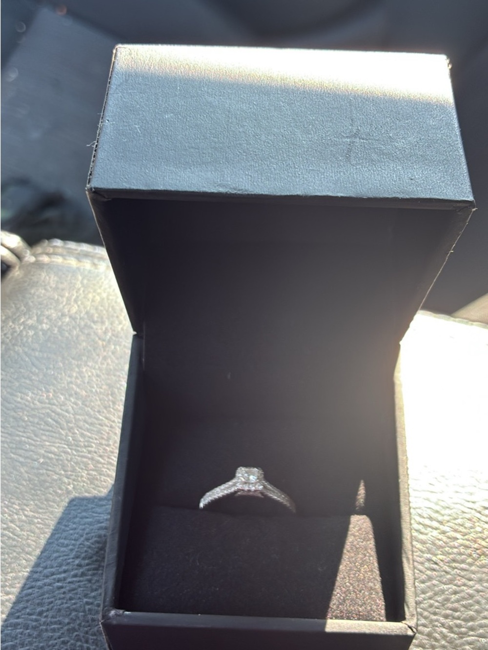 Elegant Silver-Tone Halo Engagement Ring with Clear Stone